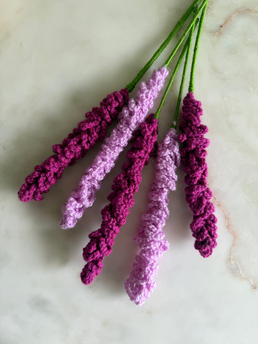 Crocheted lavender on a marble surface