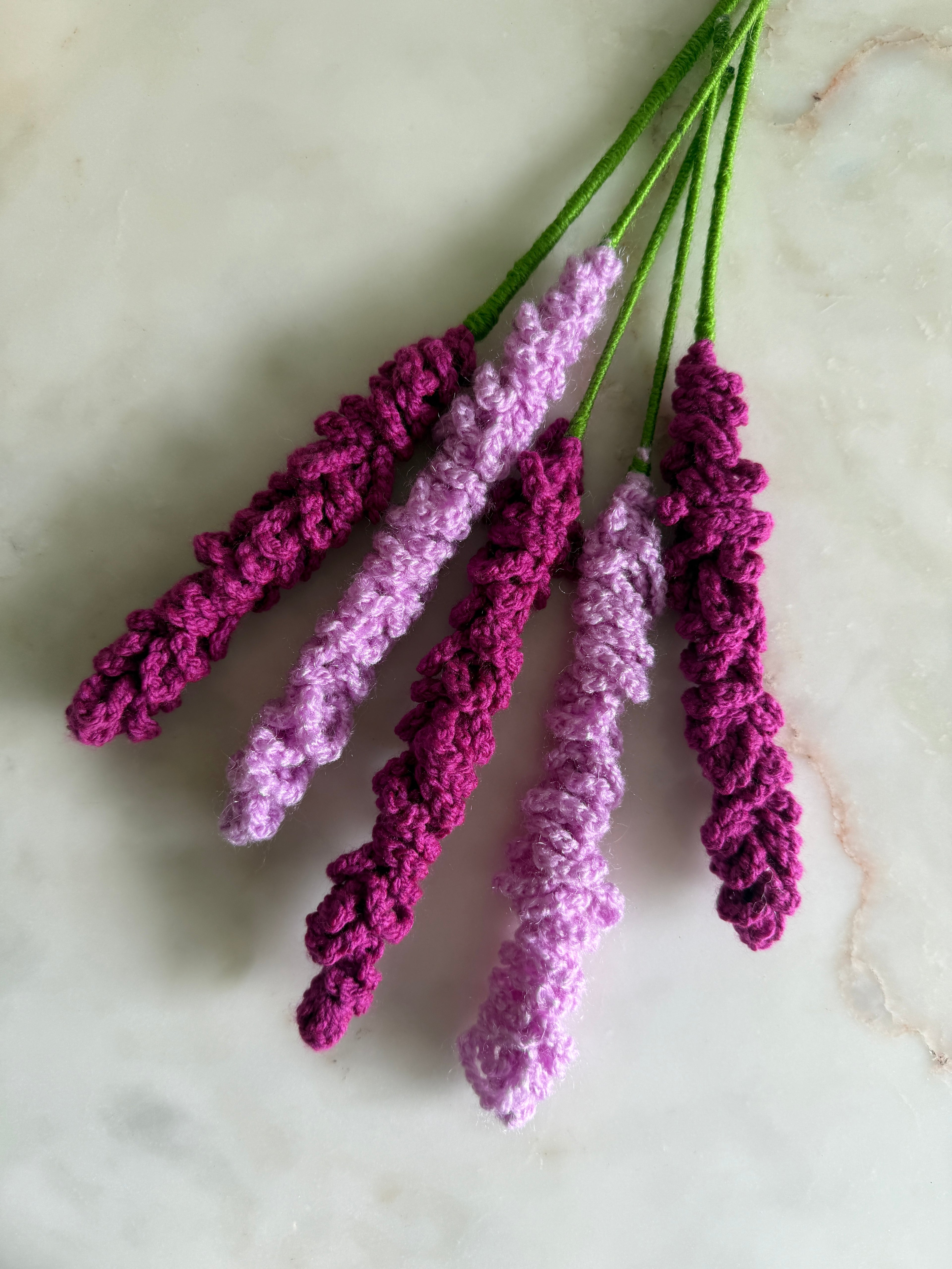 Crocheted lavender on a marble surface